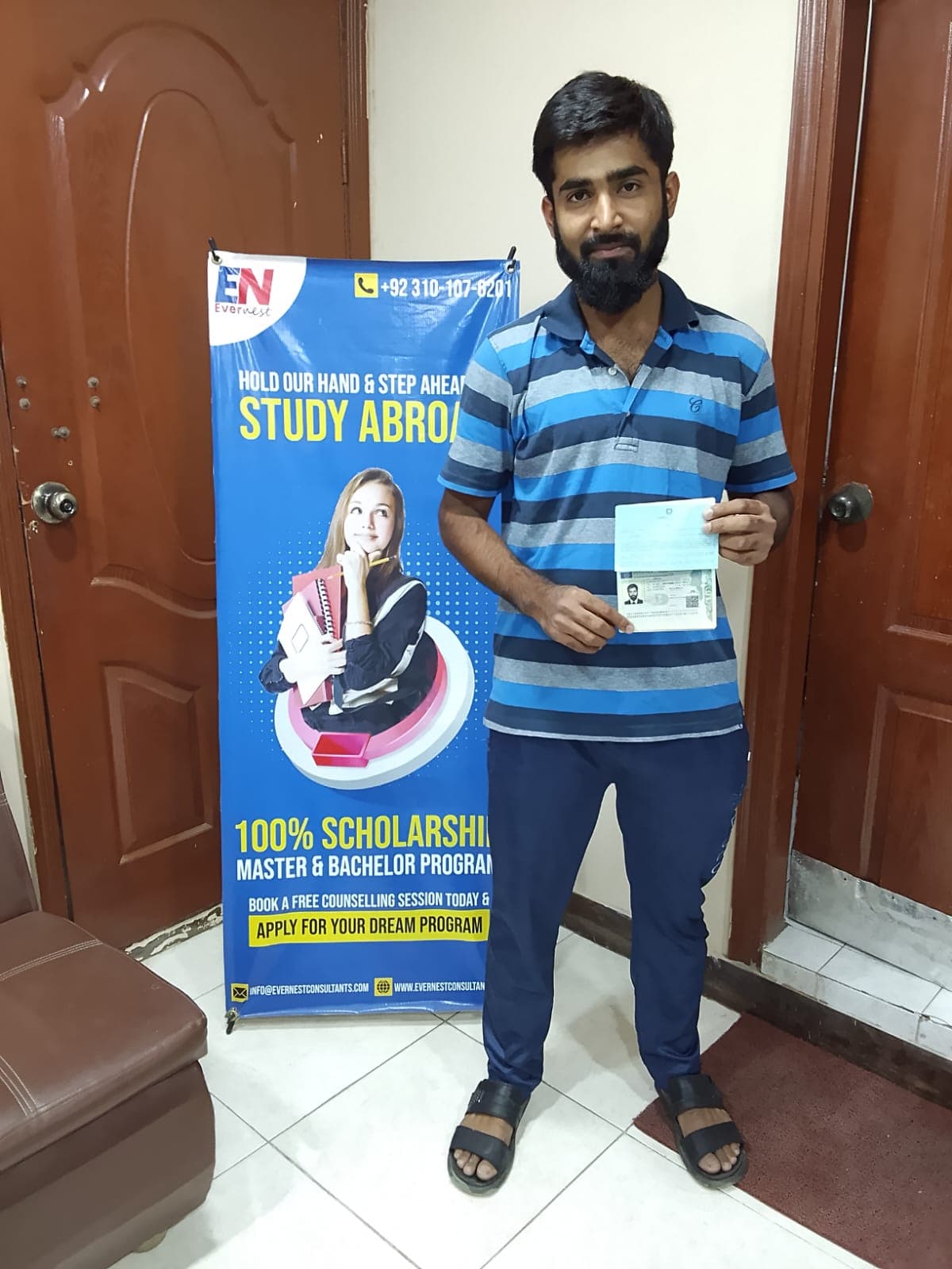 Success Story 4 holding visa approval documents