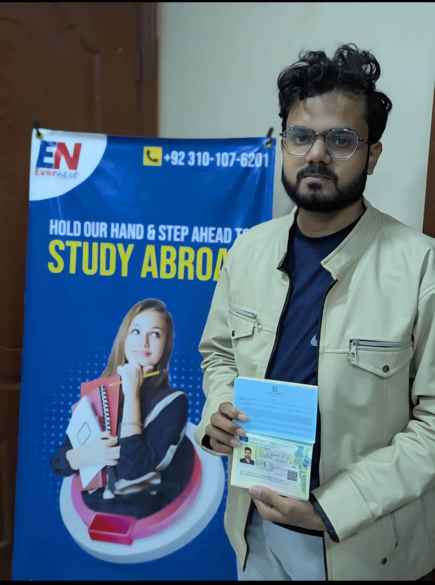 Success Story 6 holding visa approval documents